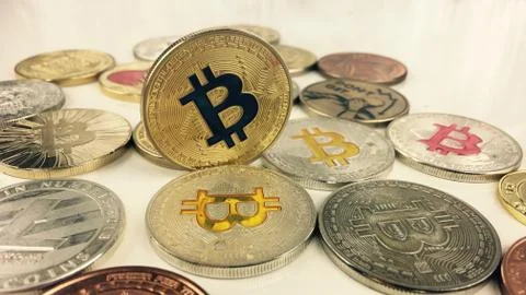 Bitcoins on table Stock Photos