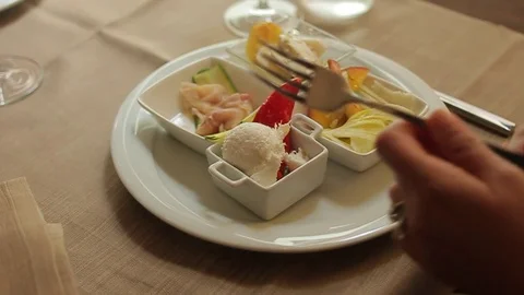 A bite of "Baccalà mantecato", a tipical venetian appetizer Stock Footage 77807887