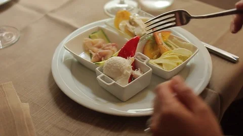 A bite of "Baccalà mantecato", a tipical venetian appetizer Stock Footage 77807889