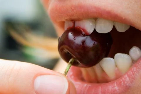 A bite of cherry 스톡 사진