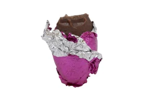 A bite in chocolate egg candy Stock Photos