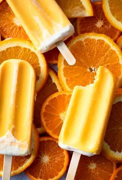 Bite out of an orange creamsicle Stock Photos