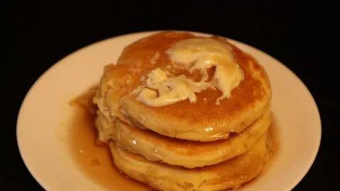 Bite of Pancakes with Syrup and Butter for Breakfast Stock Footage 127264841