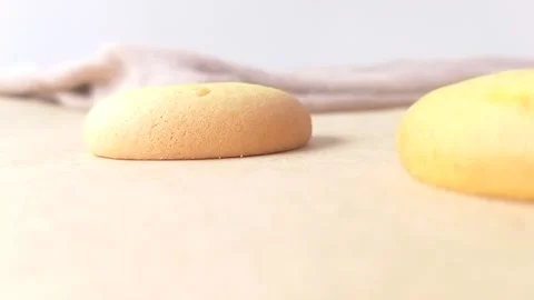 A bite of pineapple biscuit with a white background Stock Footage 146249766
