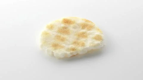 Bite-Sized Rice Crackers 스톡 동영상 327403345