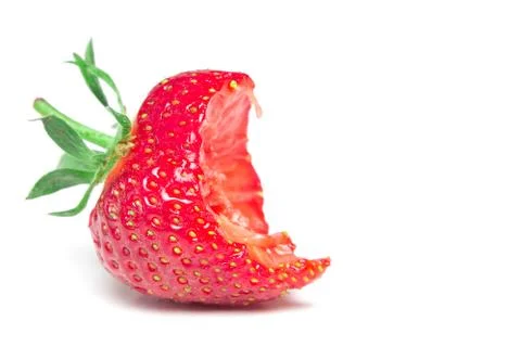 Bite strawberry Stock Photos