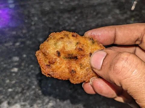 A Bite of a tea time Indian Snacks or Bonda or Vade Stock Photos