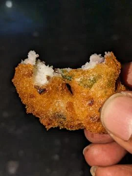 A Bite of a tea time Indian Snacks or Bonda or Vade Stock Photos