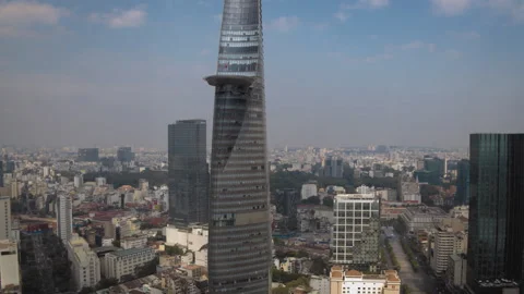 Bitexco financial tower standing above ho chi minh city skyline Stock Footage 329500481