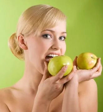 Biting apple Stock Photos