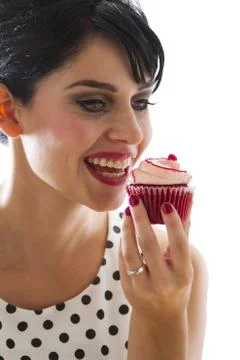 Biting the cupcakes Stock Photos