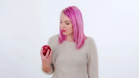 Biting into a delicious red apple Stock Footage 83724461