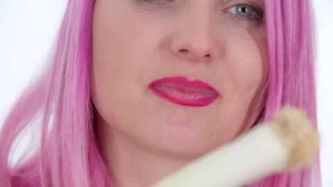 Biting into a leek Stock Footage 83725243