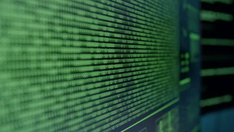 Bits and bytes. Screen with binary code down, illuminated in green. Big data Stock Footage 313931631