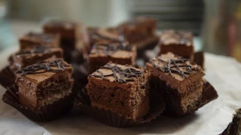 Bits of chocolate cake on the table. A delicious dessert for a celebration. Past Stock Footage 262908368