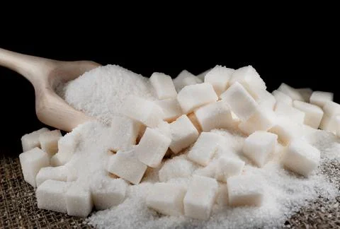 Bits of refined sugar are scattered across the fabric Foto stock
