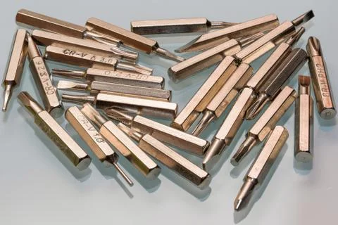 Bits for screwdriver on glass background Foto stock