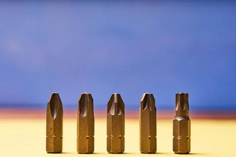 Bits for screwdrivers on a colored background Stock Photos