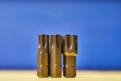 Bits for screwdrivers on a colored background Stock Photos