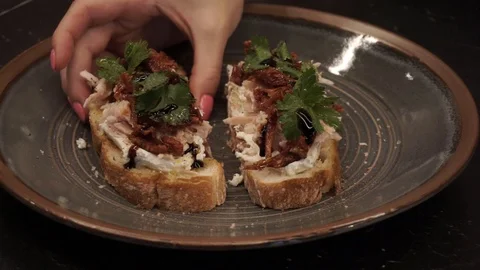 Bitten off bruschetta Stock Footage 113527474