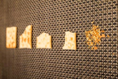 Bitten crackers process Stock Photos