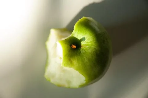 Bitten Green Apple Stock Photos