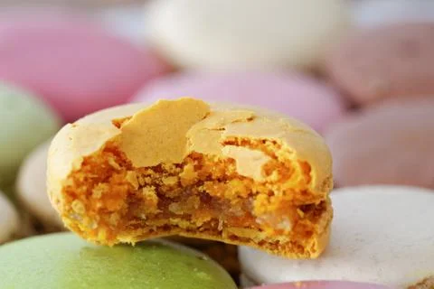 Bitten macaron Stock Photos