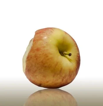 Bitten red apple on a white background Stock Photos