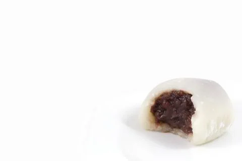 Bitten white mochi Stock Photos
