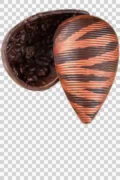 Bitter chocolate Easter egg with almonds crunchy, on a wooden board. Surrou.. Stock Photos