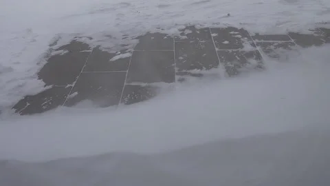Bitter Cold Wind And Snow over pedestrian road plates, small vortex over plat Vídeos de archivo 147410430