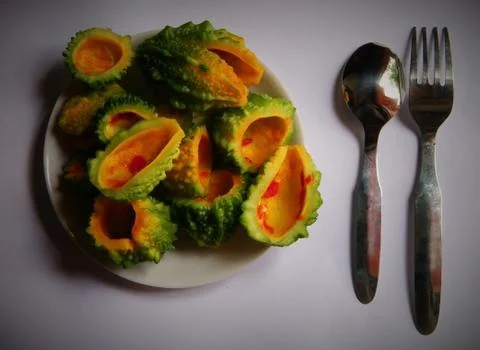 Bitter melon on plate Stock Photos