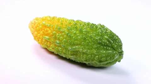 Bitter melon on white background, rotating Stock Footage 314201978