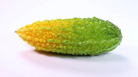 Bitter melon on white background, rotating Video stock 314972766