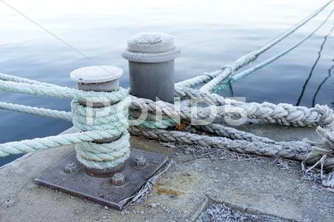 Bitts and mooring lines Stock Photos