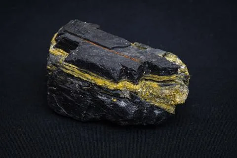 Bituminous coal piece sulfurous content causing yellow lines in structure Stock Photos