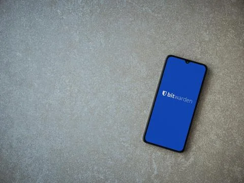 Bitwarden Password Manager app launch screen on smartphone on ceramic stone.. Stock Photos