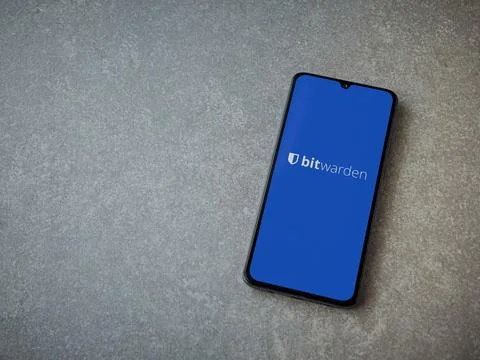Bitwarden Password Manager app launch screen on smartphone on ceramic stone.. Stock Photos