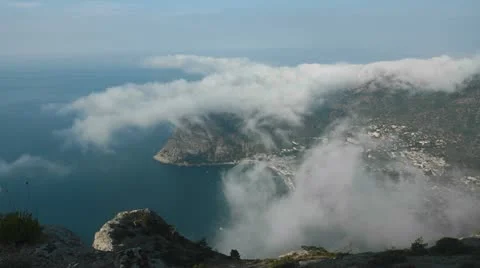 Bizarre clouds over the coast of the Sea Stock Footage