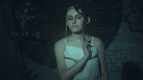 Bizarre cute woman is posing with creative fashion makeup Stock Footage 88432158