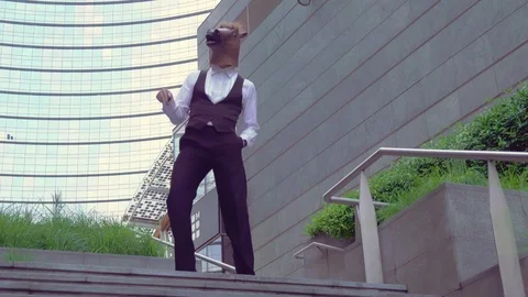 Bizarre dancer cheerful dance in the streets Stock Footage 116275836