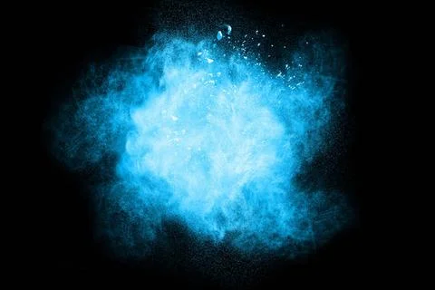 Bizarre forms of blue powder explode cloud on background. Launched blue du... Foto stock