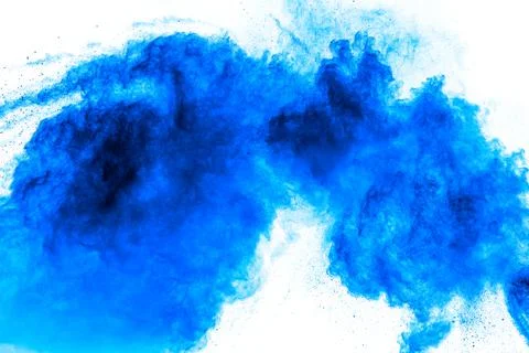Bizarre forms of blue powder explosion cloud on white background. Stock Photos