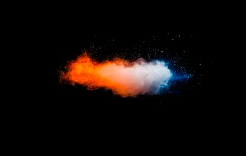Bizarre forms of color powder painted and flour combined explode. Stock Photos