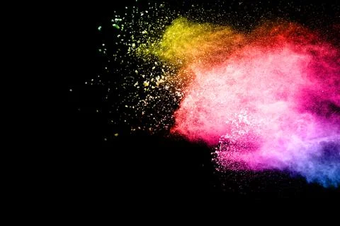 Bizarre forms of powder painted and flour combined explode. Stock Photos