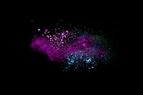 Bizarre forms of powder painted and flour combined explode Stock Photos