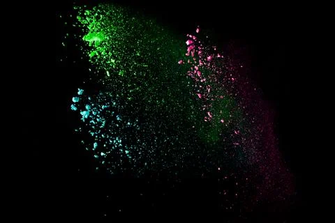 Bizarre forms of powder painted and flour combined explode Stock Photos