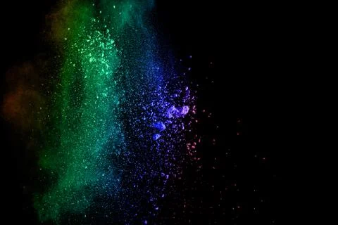 Bizarre forms of powder painted and flour combined explode Stock Photos