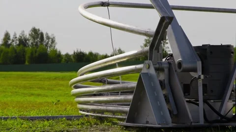A bizarre frame invention for covering a small helicopter parking space Vídeos de archivo 281942957