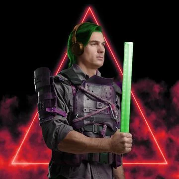 Bizarre guy dressed in armor and headphones holding stick 库存照片